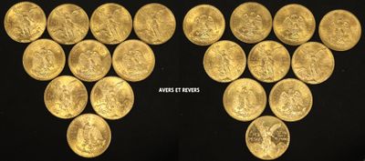 a close up of a bunch of gold coins on a black surface