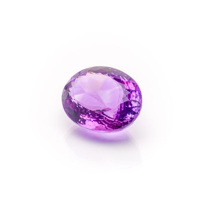 a purple amethorate gems on a white background