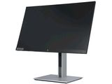 the monitor is sitting on a metal stand on a white surface