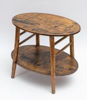 A. GARNIER. Une table basse à deux plateaux ovales à décor p… (photo 2)