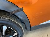a close up of a car door with a sticker on it