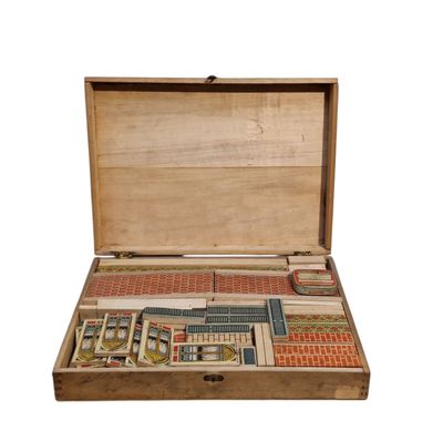 a wooden box with a game in it on a white background