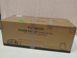 a box that is sitting on a table next to a bottle
