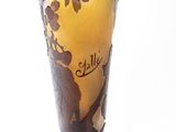 a vase that has a picture of a woman and a horse on it