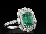 an emerald and diamond ring