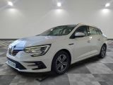 a white car is parked on a checkered tile floor