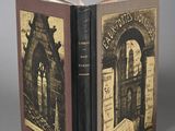 two books sitting on top of each other in front of a gray background