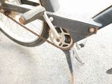a close up of a bike with a chain attached to it