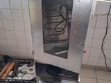 an image of a kitchen with a stove and a bunch of donuts