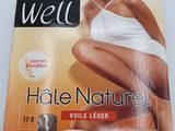 an image of a magazine with a picture of a woman in a white dress