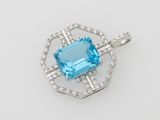 a blue topaz stone and diamond pendant