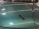 a car that has a remote control on the hood of it