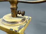 an old fashioned coffee grinder with a handle on it