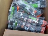 a cardboard box full of toothbrushes and toothpaste