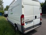 a white van that is parked in a parking lot