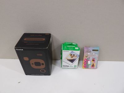 a small box and a smaller box on a table