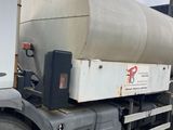 an image of a large tanker truck parked on the side of the road
