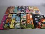 a lot of comic books on the table