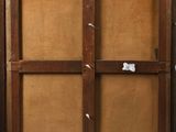 a picture of an old wooden cabinet in the corner of a room
