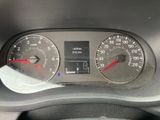 a close up of a car dashboard with a speedometer and gauges