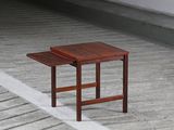 a small table that is sitting on the concrete floor