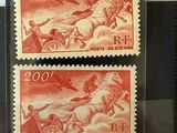 two stamps with a picture of a man on a horse and a woman on a horse