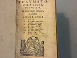 a book with a picture of a sundial on it