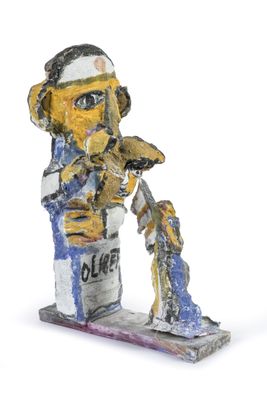 statue of a man with a tennis racket in his hand