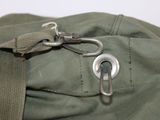 a bag with a metal hook attached to it