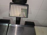 une photo d'une balance sur laquelle est posé un écran