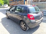 a small car that is parked in a parking lot
