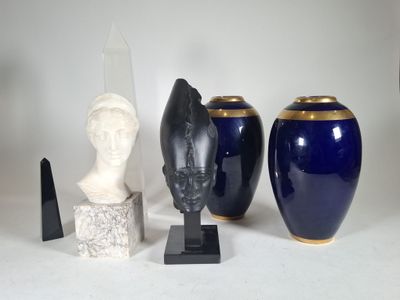 three vases that are sitting next to each other on a table