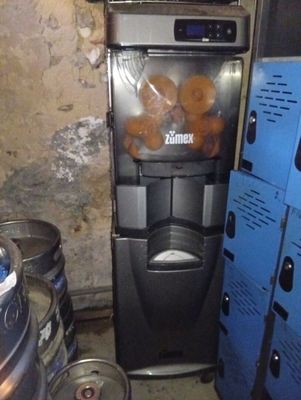an image of a machine that has some donuts in it