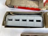 a box with a model train in it and a box with a model train in it