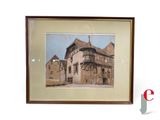 peinture représentant un vieux bâtiment, encadrée, sur fond blanc