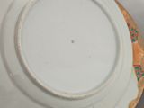 a white plate that is sitting on top of a table