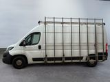 an image of a white van parked in a parking lot