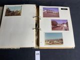 an open book with pictures on it on a table