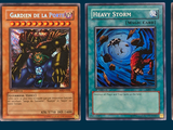 four different cards of different colors and designs on a blue background