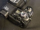 a close up view of a digital camera on a table