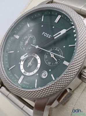 a close up of a watch on display in a box