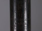 close up of a baseball bat with a black and white design on it