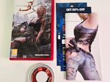 the contents of a video game including a dvd and a game disc