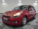 a picture of a red car in a showroom