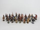 a group of figurines of soldiers on horseback with spears and spears