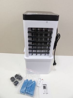 une image représentant un petit ventilateur posé sur une table