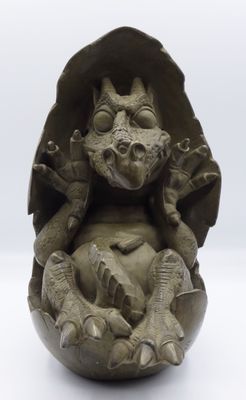 a statue of a woman holding a baby in her arms
