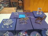 a lot of glass figurines sitting on a table