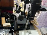 an image of a microscope set up on a table