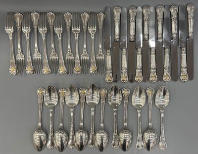 a lot of spoons and forks that are on the table